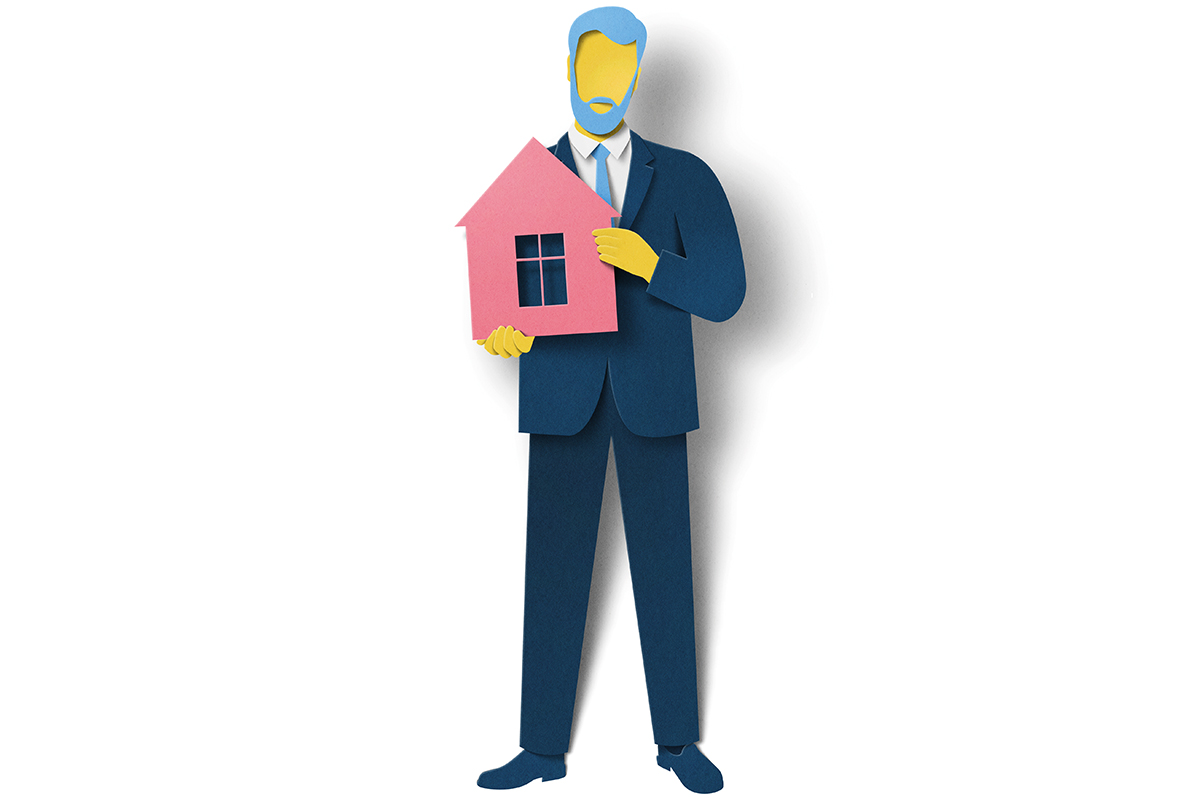 Man holding house